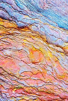 Colourful sedimentary rocks formed by the accumulation of sediments Ã¢â¬â natural rock layers backgrounds, patterns and textures -